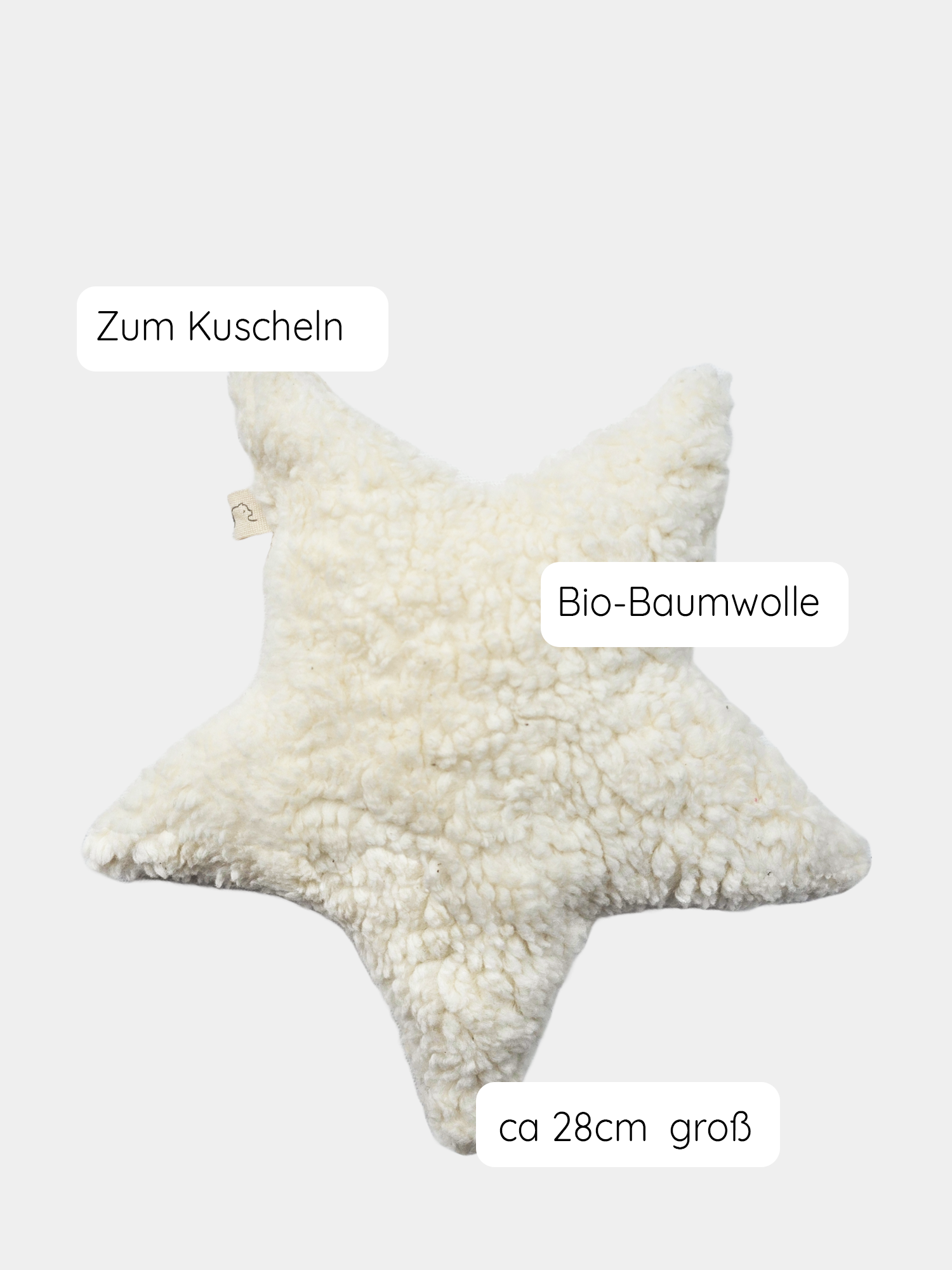 Großer Kuschelstern Bio-Teddy - Natur, ein weißes, sternförmiges Kissen aus 100% Bio-Baumwolle, handgenäht, nachhaltige Geschenke zur Geburt für Babys und Kinder.